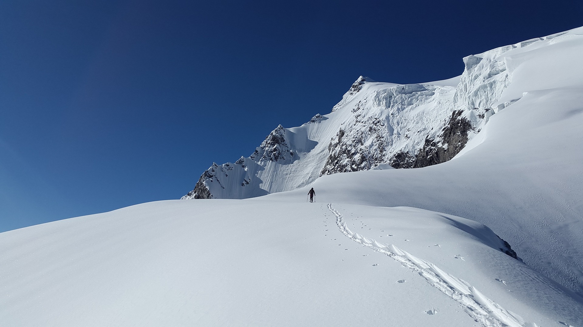 How to start backcountry skiing - photo of a skier deep in the backcountry
